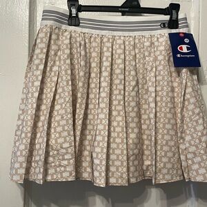 Champion White and Tan Pleated Skater Mini skirt with shorts under